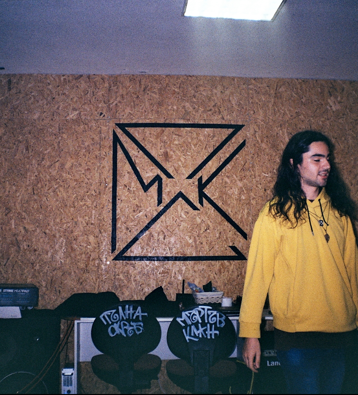 PSMK logo painted on the studio wall