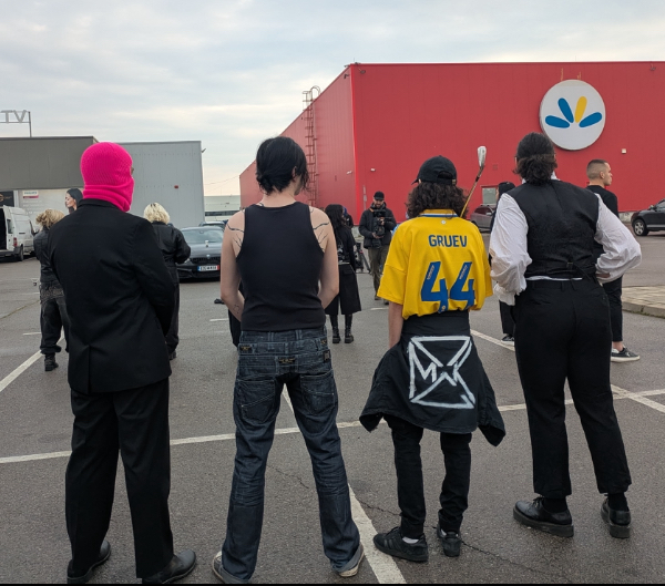 Crew member wearing a jacket with the PSMK logo